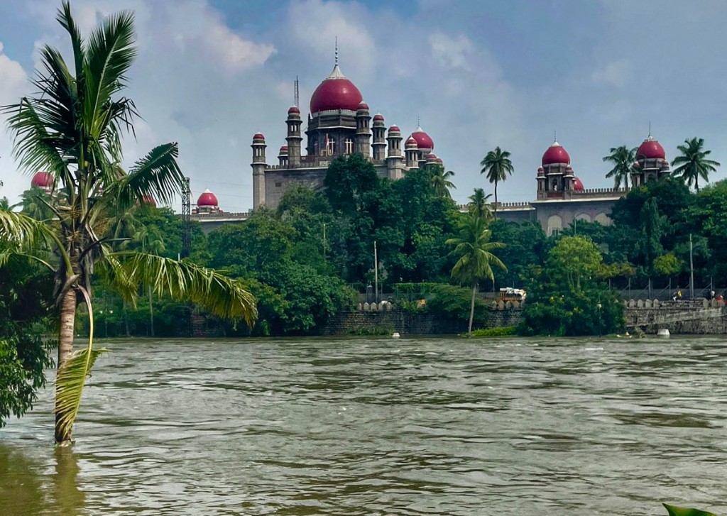 Moosi River in Hyderabad with the High Court behind—the river Naffys Mir named Moosi Web after.
